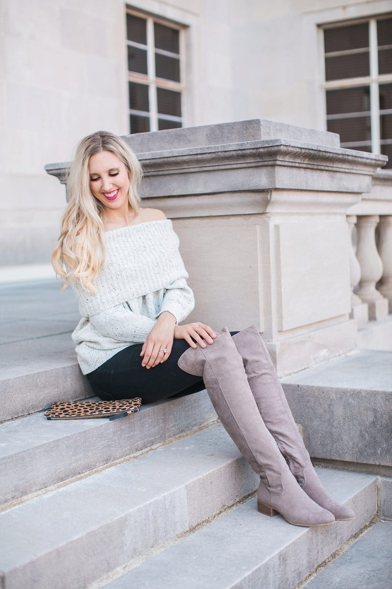 blush and camo, over the shoulder sweater, over the knee boots, black jeans, blonde hair, clare v, clare v clutch